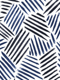 This wallpaper, inspired by New York artist Jasper Johns and the Bloomsbury Group, combines repeating black and navy blue brushstrokes to create a modern, abstract striped design